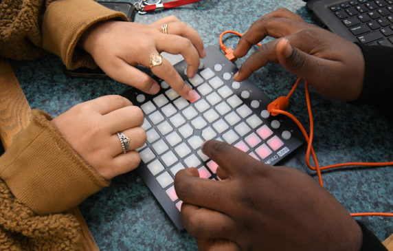 students using music technology