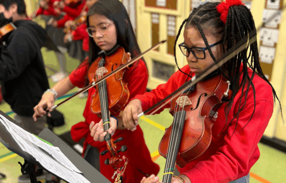 Students playing violins